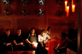 Federico Sanchez (Pico Be, bei der Lampe), Dirk Wagner vom Stadtfeuilleton der SZ (links daneben) und Filmregisseur Martin Hans Schmitt (links von ihm) lesen 'Im Hofgarten - Save Our Souls' Federico Sanchez (Pico Be), Dirk Wagner, Martin Hans Schmitt